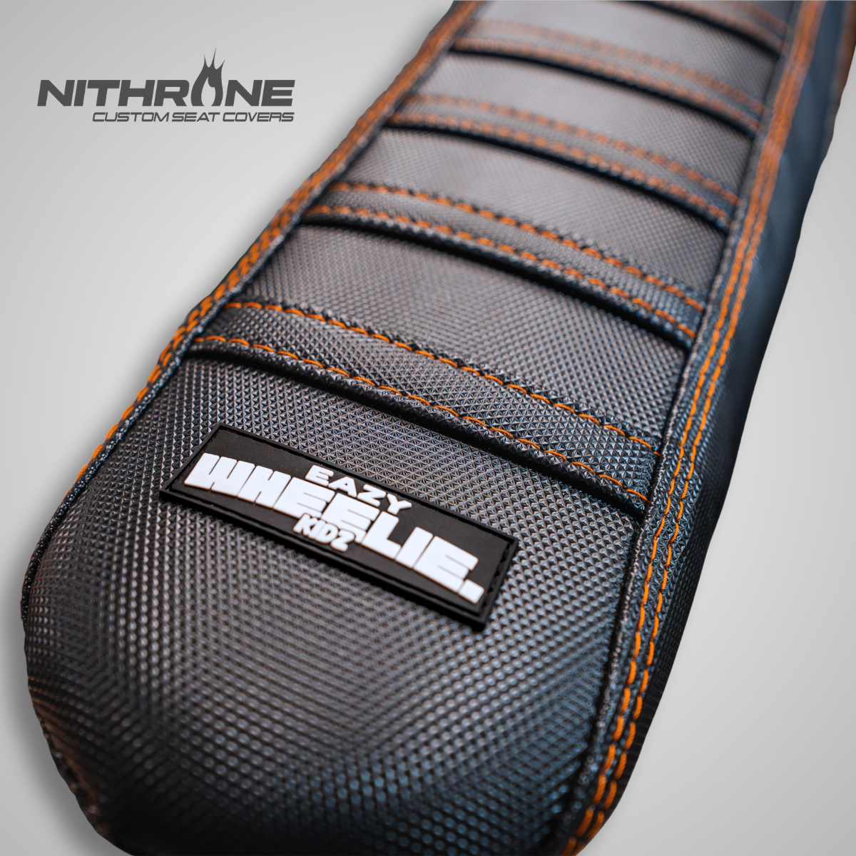 EazyWheelieKidz branded Nithrone seat cover – close-up of stitching